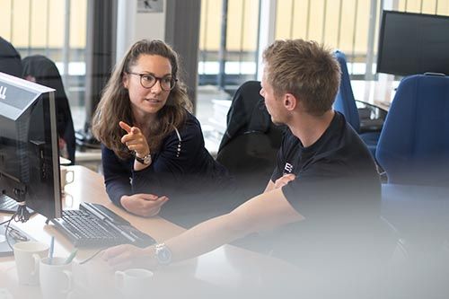 Office picture with male and female.jpg